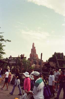Crowds wandering the Frontierland area at Disneyland — Disneyland Paris, France (2-8 July 2000)