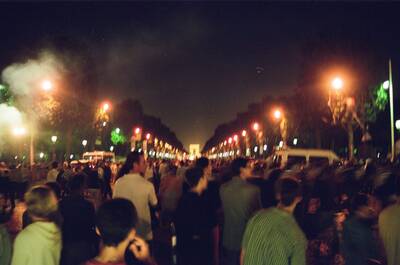 Crowds and flares filling the Champs-Elysees in World Cup celebration — Paris, France (2-8 July 2000)