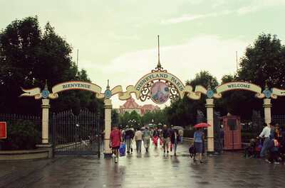 The Bienvenue welcome arch at the Disneyland entrance — Disneyland Paris, France (2-8 July 2000)