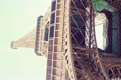 Looking up the curving legs of the Eiffel Tower — Paris, France (2-8 July 2000)