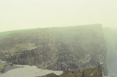 The flat-topped Cliffs of Moher fading into haze — County Clare, Ireland (29 June - 6 July 2000)