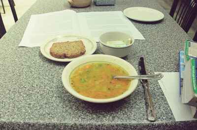 A bowl of soup and brown bread at a cafe table — Dublin, Ireland (29 June - 6 July 2000)