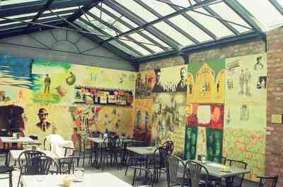 A cafe with colourful James Joyce Dubliners murals — Dublin, Ireland (29 June - 6 July 2000)