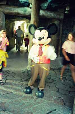 Mickey Mouse greeting visitors on a ride set — Disneyland Paris, France (29 June - 6 July 2000)