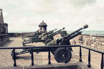 A row of cannons along the castle ramparts — Edinburgh, Scotland (August 2000)