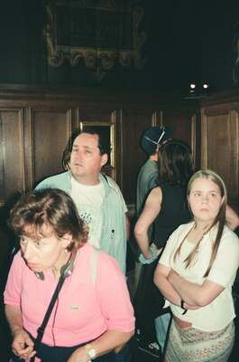 An antique armchair in a wood-panelled castle room — Edinburgh, Scotland (August 2000)