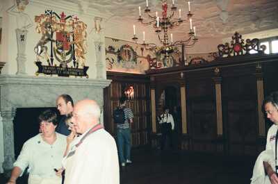 Visitors in the Great Hall beneath the James VI arms — Edinburgh, Scotland (August 2000)