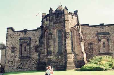 Richard seated on the lawn before the Scottish National War Memorial — Edinburgh, Scotland (August 2000)