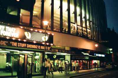 The illuminated theatre exterior at night — London, England (mid-August 2000)