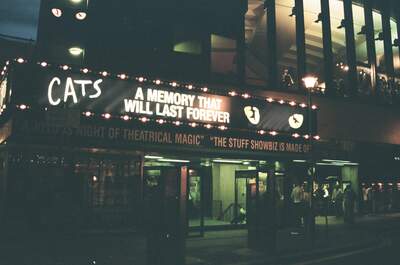 The bright 'Cats' marquee glowing above the entrance — London, England (mid-August 2000)