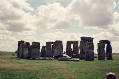 The full circle of Stonehenge under billowing clouds — Stonehenge, England (mid-August 2000)