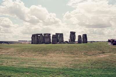 The standing stones of Stonehenge under a cloudy sky — Stonehenge, England (mid-August 2000)