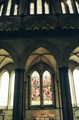 Gothic arches and a stained-glass window in the cathedral — Salisbury, England (mid-August 2000)