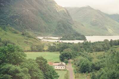 The Glenfinnan Monument tower beside Loch Shiel — Glenfinnan, Scotland (late July 2000)
