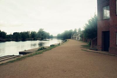 The Thames towpath past the college boathouses — Oxford, England (August 2000)