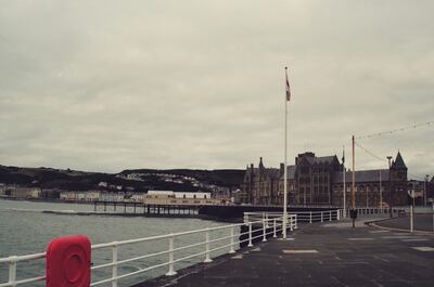 The Aberystwyth seafront promenade and university building — Rome, Wales (August 2000)