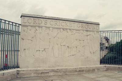The carved stone gate relief of Lord's Cricket Ground — London, England (August 2000)