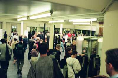 Commuters crowding an Underground ticket hall — London, England (August 2000)