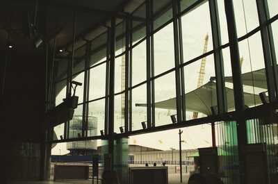 The Dome behind glass at North Greenwich station — London, England (August 2000)