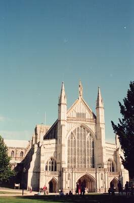 Winchester Cathedral's west front in summer sun — Winchester, England (August 2000)