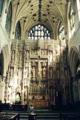 Choristers in red robes in the cathedral choir — Winchester, England (August 2000)