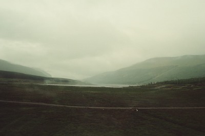 A misty glen with a loch in the Highlands — Scottish Highlands, Scotland (late July - early August 2000)