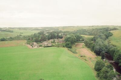 A wooded valley with a farm hamlet and river — Aberdeen, Scotland (late July - early August 2000)