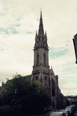 St Nicholas church spire against a cloudy sky — Aberdeen, Scotland (late July - early August 2000)