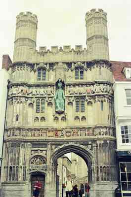 Visitors below the carved Christ Church Gate — Canterbury, England (mid-August 2000)