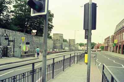 A pavement following the flint Canterbury city walls — Canterbury, England (mid-August 2000)