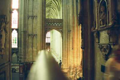 Sunlight streaming through a tall cathedral aisle — Canterbury, England (mid-August 2000)