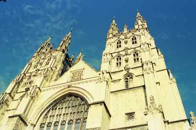 The twin Gothic towers of Canterbury Cathedral against blue sky — Canterbury, England (mid-August 2000)