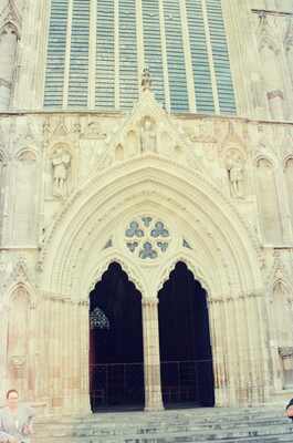 The carved west front and arched window of York Minster — York, England (mid-August 2000)