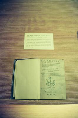 An old open pamphlet by John Knox in a wooden case — Edinburgh, Scotland (August 2000)