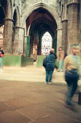 Visitors crossing the nave inside St Giles' Cathedral — Edinburgh, Scotland (August 2000)