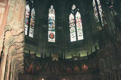 Stained-glass windows above carved choir stalls at St Giles' — Edinburgh, Scotland (August 2000)