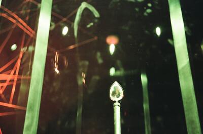 A teardrop-shaped jewel glowing on its plinth — London, England (August 2000)