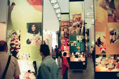 Tall illustrated panels in the Community exhibit — London, England (August 2000)