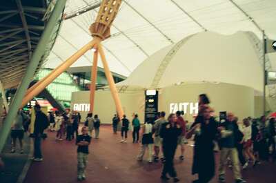 Crowds outside the dome-shaped Faith zone pavilion — London, England (August 2000)