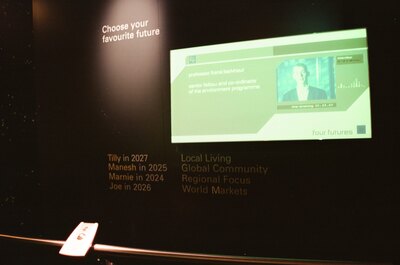 A screen inviting visitors to choose a future scenario — London, England (August 2000)