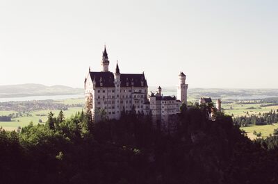 Neuschwanstein Castle on its forested crag — Fussen, Germany (19-21 June 2000)