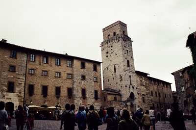 The tall stone tower beside Piazza della Cisterna — San Gimignano, Italy (6-10 June 2000)