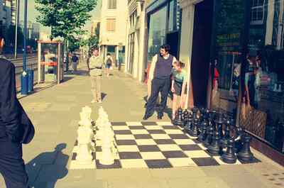 Giant pavement chess set outside the Chess & Bridge shop — London, England (August 2000)