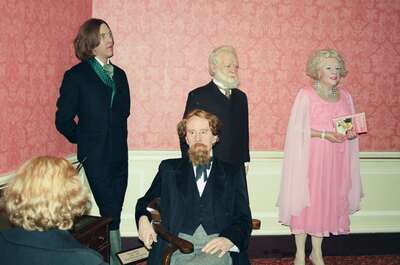 Waxwork writers including Dickens in a parlour — London, England (20-25 July 2000)