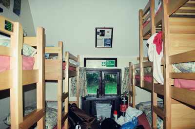 Wooden bunk beds in a youth hostel dormitory — Surrey, England (20-25 July 2000)