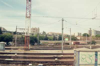 Railway tracks and apartment blocks along a Mediterranean line — Southern France, France (13-20 July 2000)