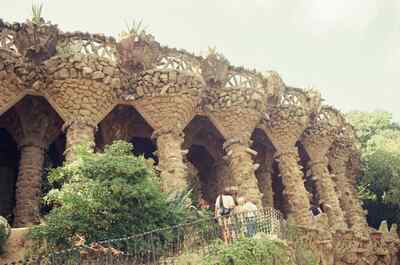 Stone colonnade of mosaic-topped pillars in Park Guell — Barcelona, Spain (13-20 July 2000)