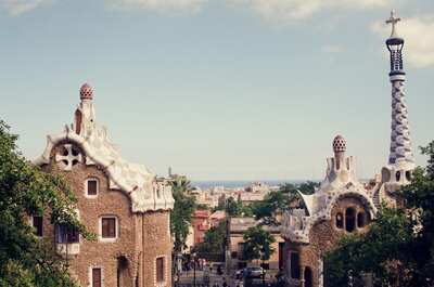 Whimsical mosaic rooftops and spire at Park Guell — Barcelona, Spain (13-20 July 2000)