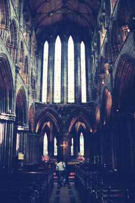 Stained-glass windows and stone arcades inside Glasgow Cathedral — Glasgow, Scotland (late July 2000)