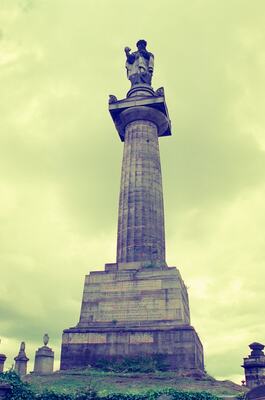 The column and statue of the John Knox Monument in the Necropolis — Glasgow, Scotland (late July 2000)